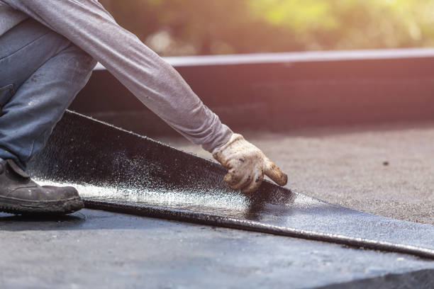 Professional Exterior Waterproofing technician working in Green Valley, WI